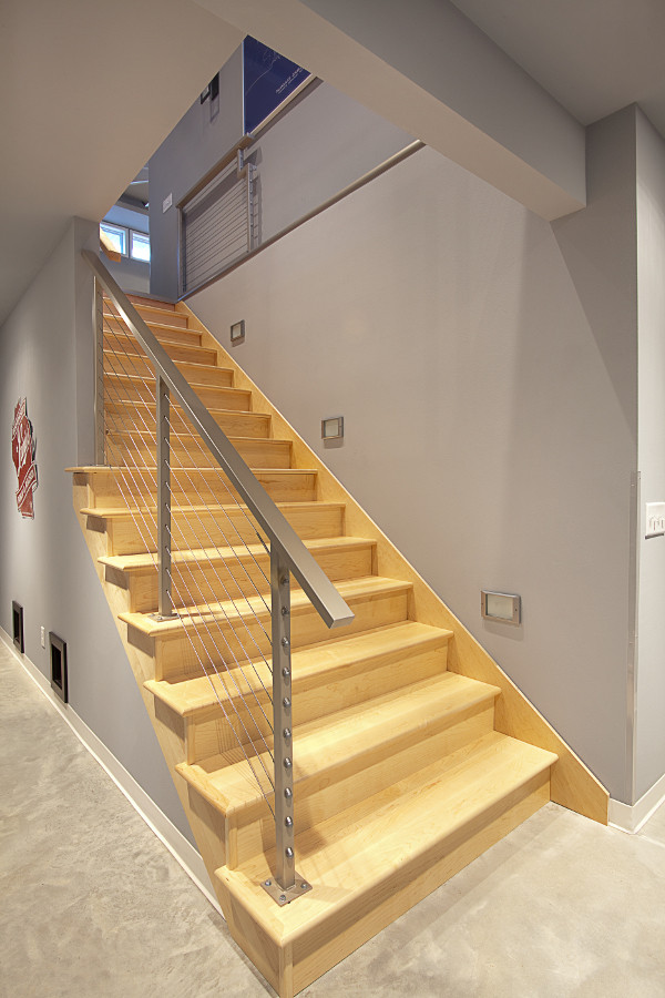 Example of a mid-sized trendy wooden straight open staircase design in Other