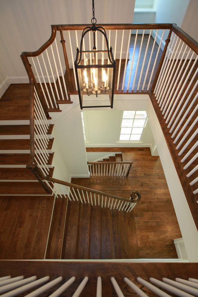 Inspiration for a traditional wood staircase in Atlanta with wood risers.