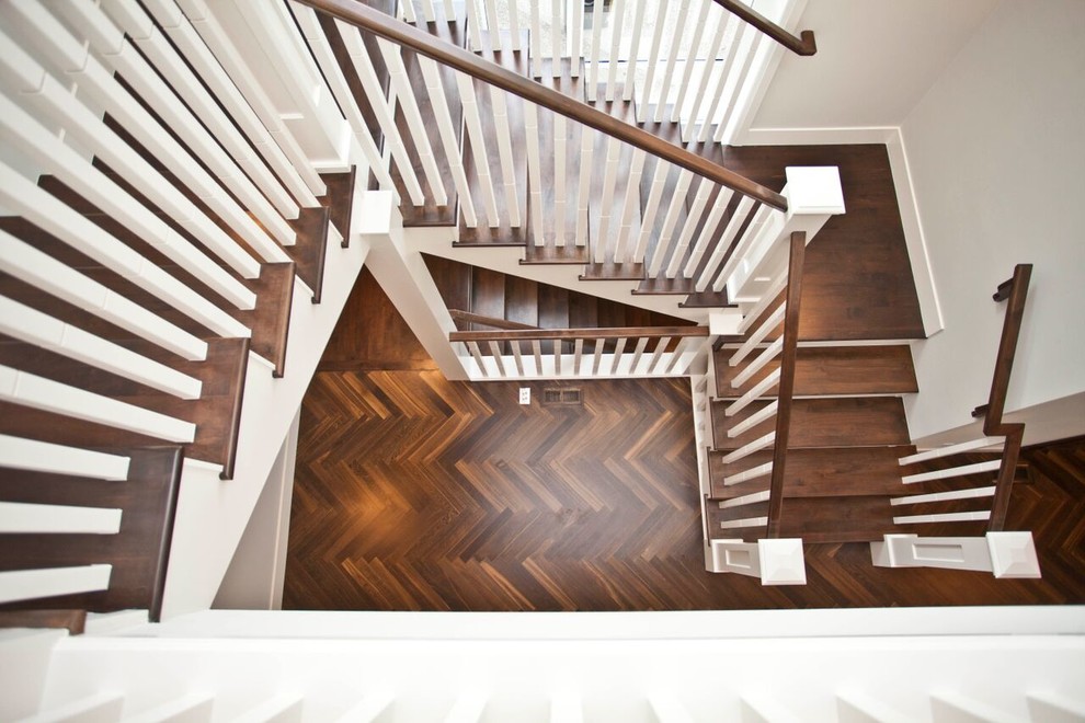 Staircase - large transitional wooden l-shaped staircase idea in Calgary with painted risers