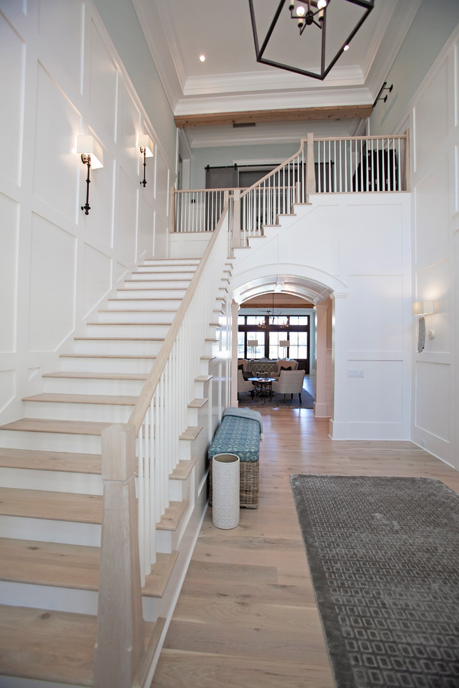 Inspiration for a large transitional wooden l-shaped staircase remodel in Atlanta with painted risers