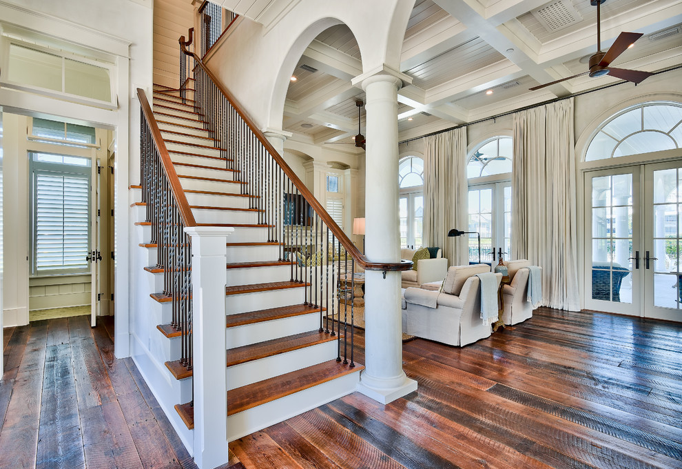 This is an example of a beach style staircase in Jacksonville with feature lighting.