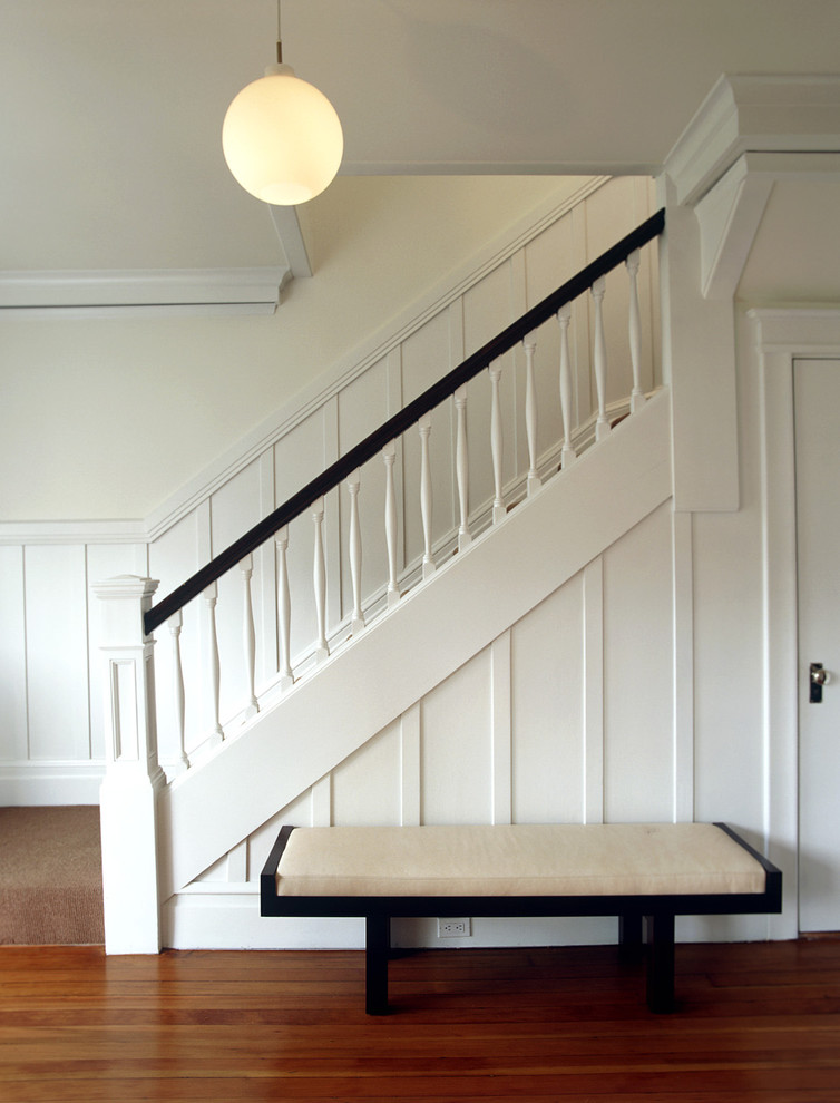 Example of a transitional carpeted staircase design in San Francisco with carpeted risers