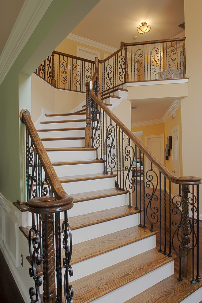 Elegant wooden staircase photo in DC Metro