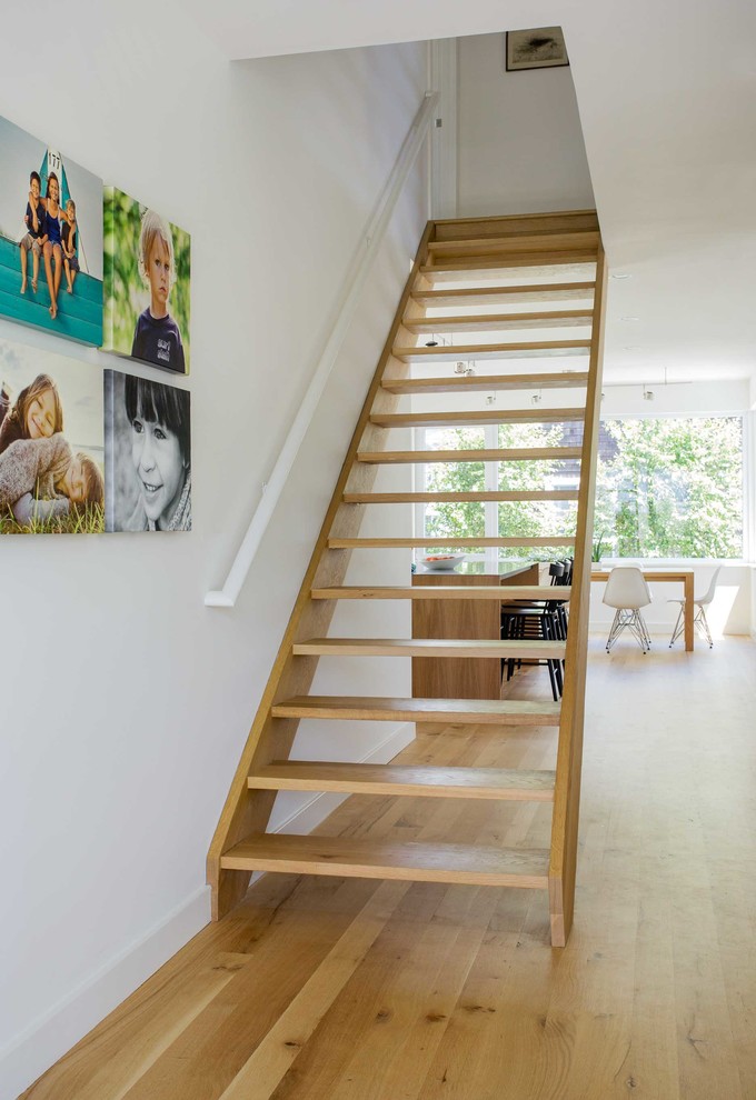 Inspiration for a coastal wooden staircase remodel in Boston