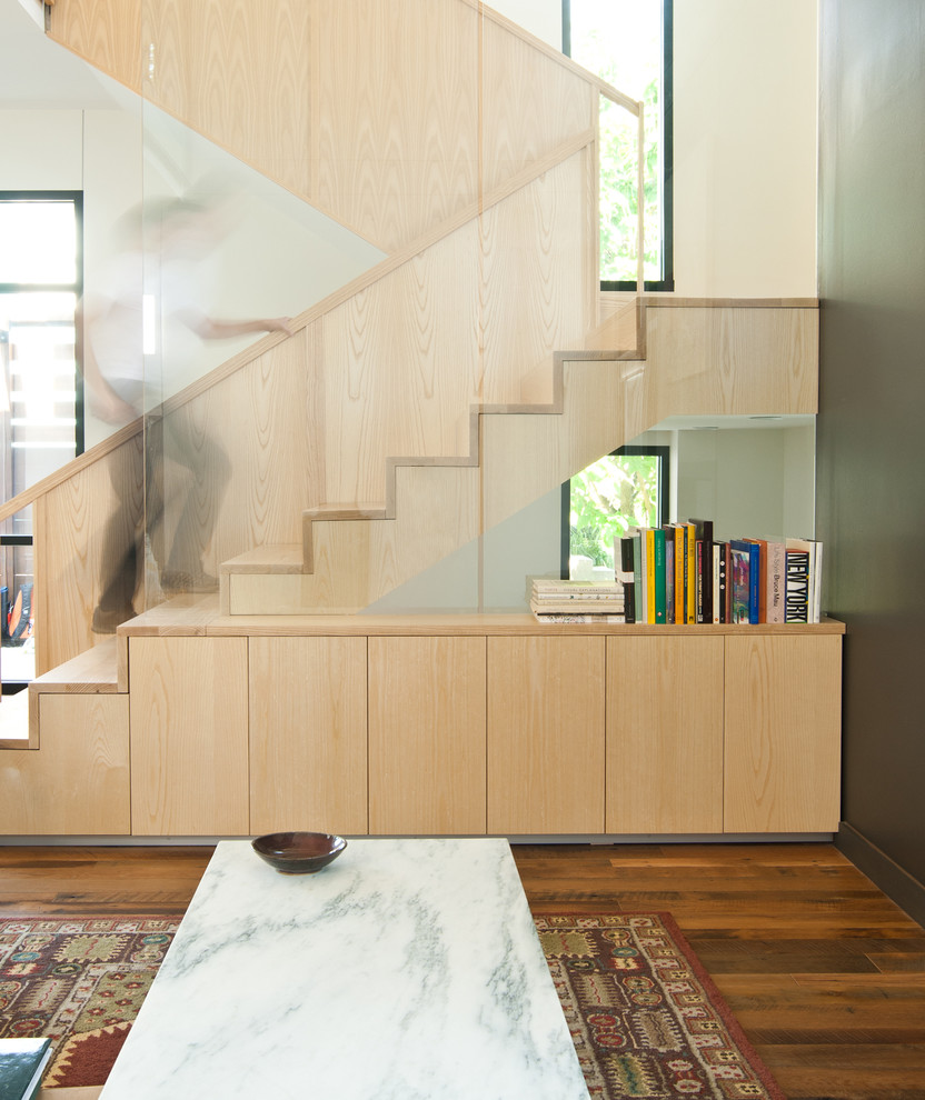Trendy wooden u-shaped staircase photo in Indianapolis with wooden risers