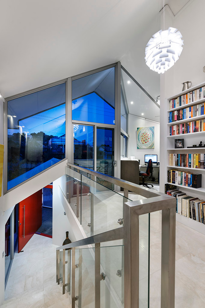 Contemporary straight glass railing staircase in Perth.