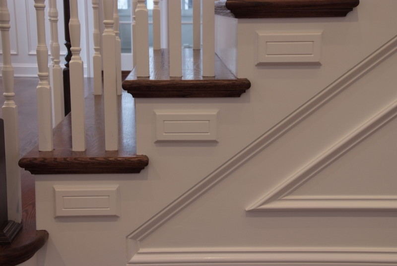 Inspiration for a timeless wooden staircase remodel in Kansas City with wooden risers