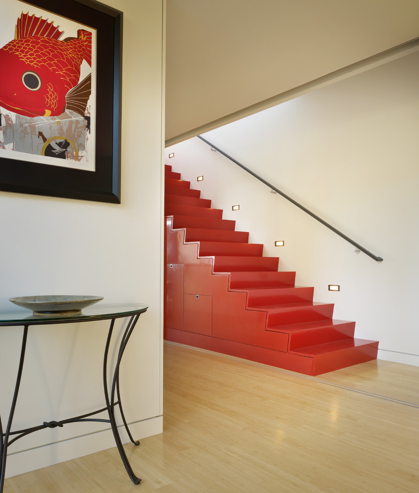 Photo of a medium sized modern straight staircase in Seattle.