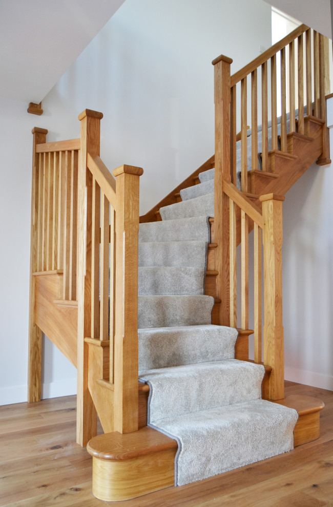 Inspiration for a medium sized traditional wood l-shaped wood railing staircase in Cornwall with wood risers.