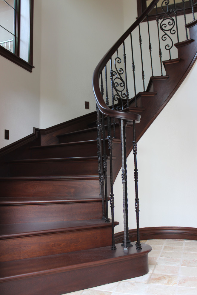 Staircase - small transitional wooden curved mixed material railing staircase idea in Other with wooden risers