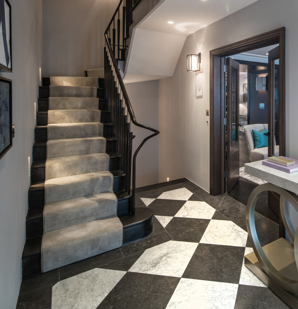 Inspiration for a mid-sized transitional staircase remodel