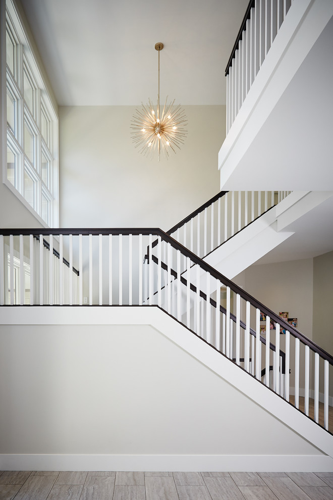 Staircase - large modern l-shaped wood railing staircase idea in Grand Rapids