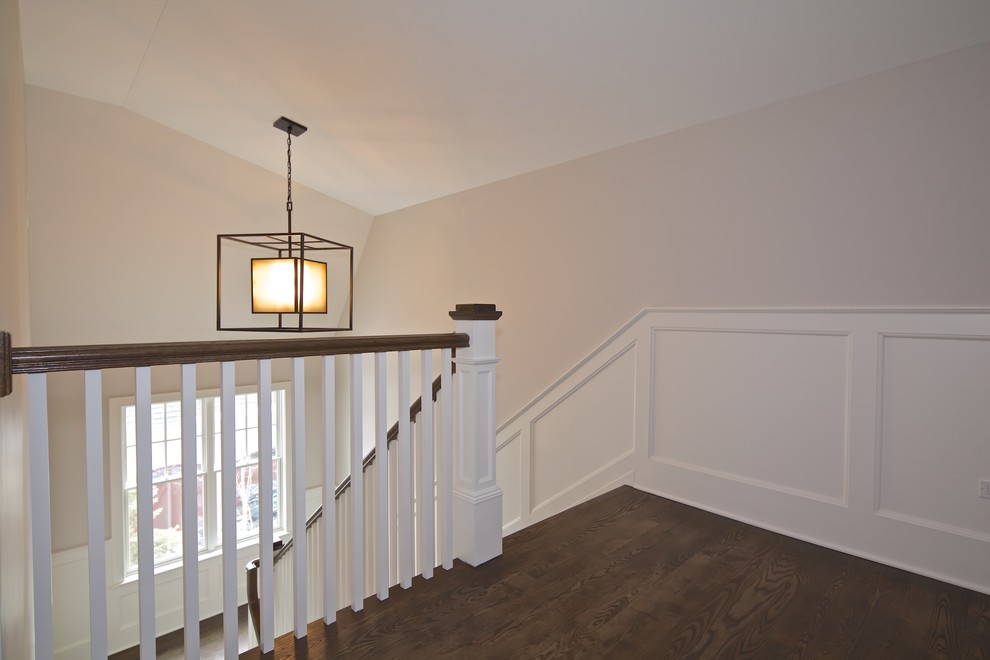 Mid-sized beach style wooden u-shaped staircase photo in Chicago with painted risers