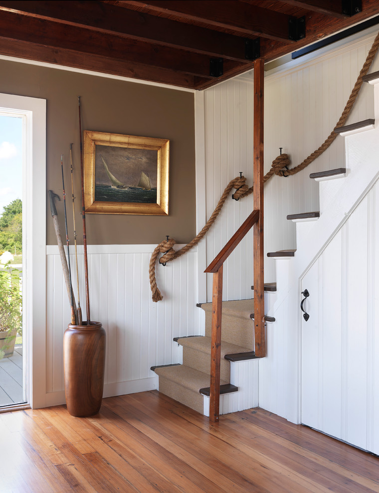 Inspiration for a coastal wooden l-shaped staircase remodel in Providence