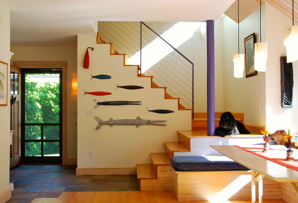 Mid-sized trendy wooden u-shaped staircase photo in Portland Maine with wooden risers
