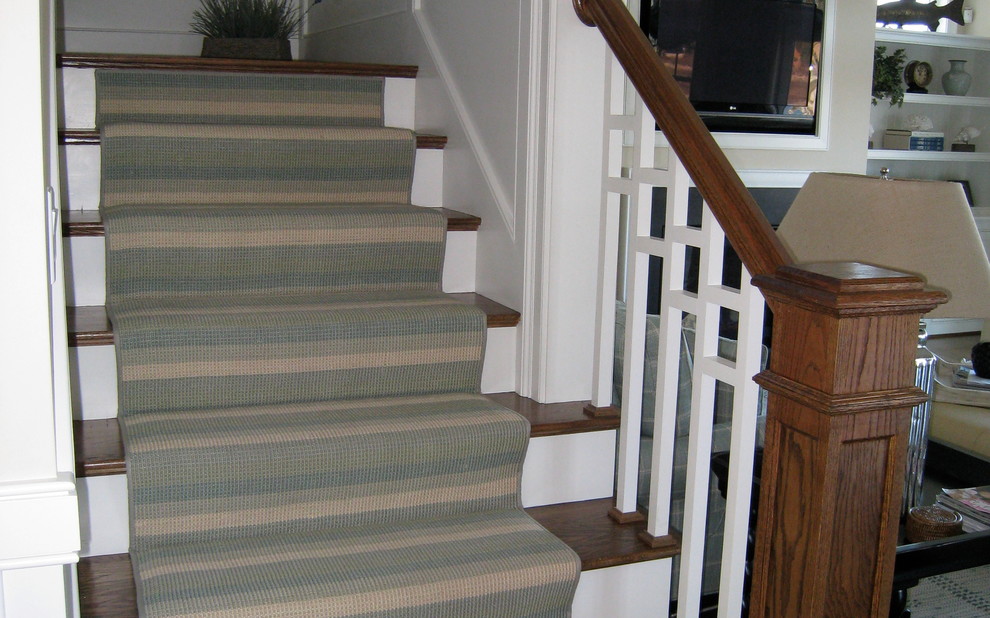 Design ideas for a medium sized traditional wood l-shaped staircase in Boston with painted wood risers.