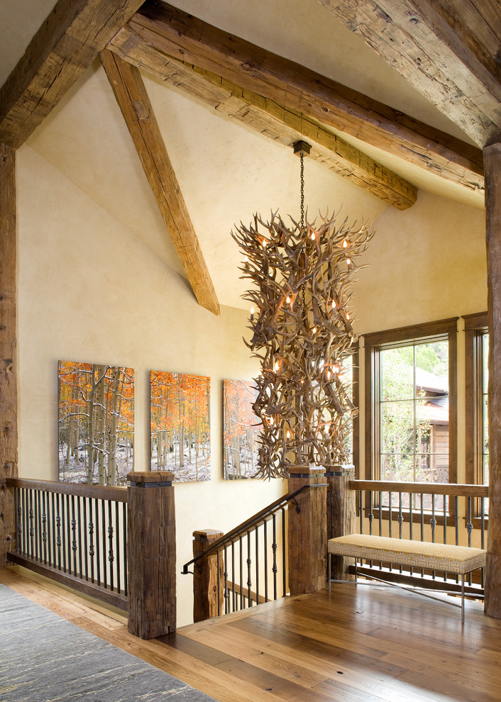 Inspiration for a rustic u-shaped staircase in Denver.