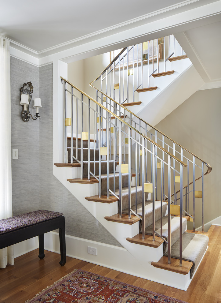 Design ideas for a classic carpeted u-shaped staircase in Minneapolis with carpeted risers.