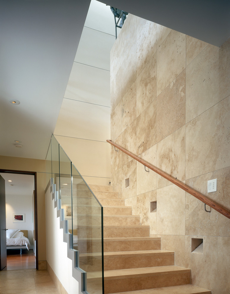 Photo of a medium sized contemporary u-shaped staircase in San Diego.