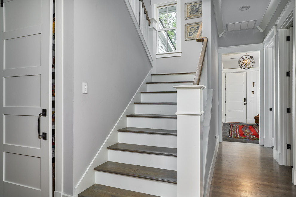 Inspiration for a large coastal curved staircase remodel in Charleston