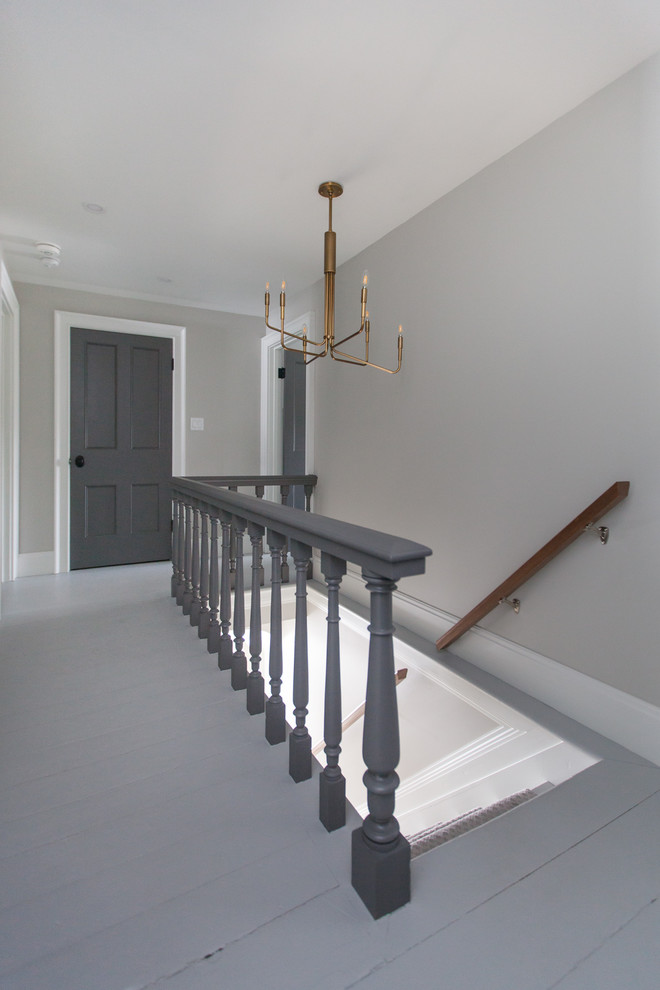 Пример оригинального дизайна: прямая лестница среднего размера в современном стиле с деревянными перилами и крашенными деревянными ступенями