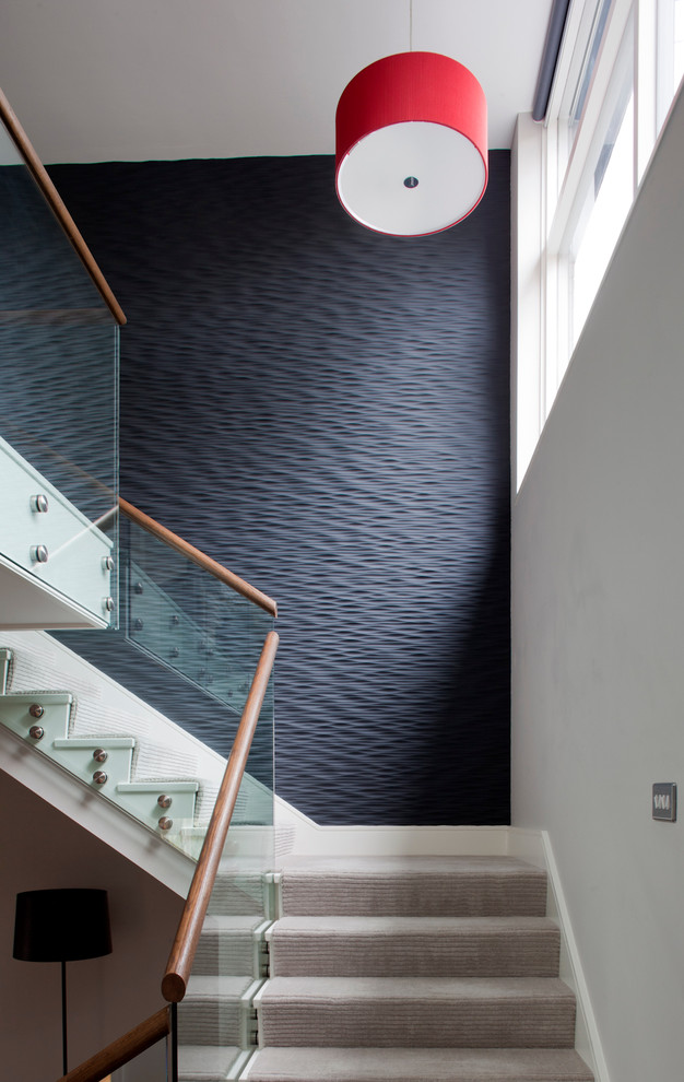 Staircase - contemporary painted staircase idea in Cornwall with painted risers