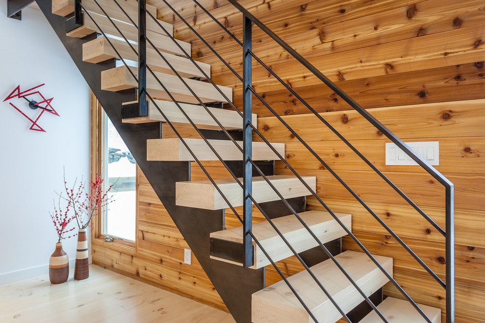 Example of a mid-sized trendy wooden straight open staircase design in New York