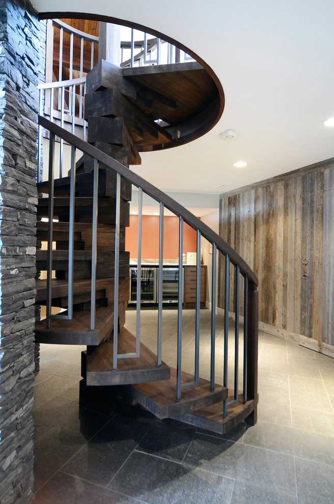 Trendy wooden spiral open staircase photo in Calgary