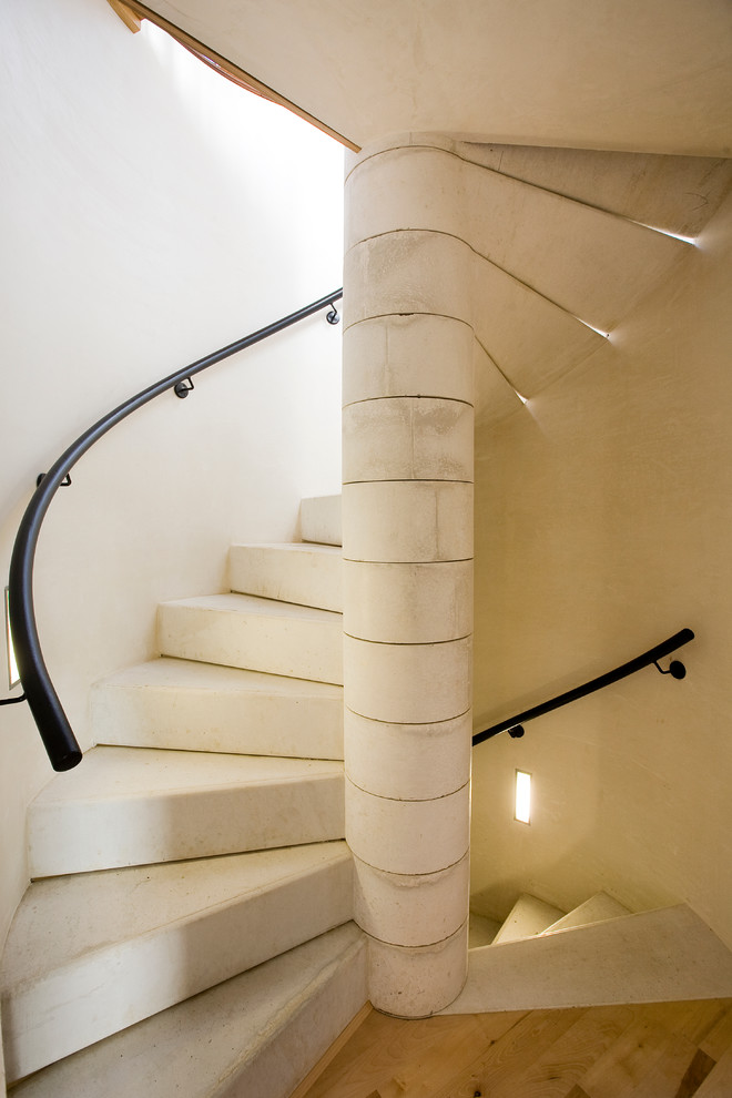 Inspiration for a contemporary spiral staircase remodel in Other