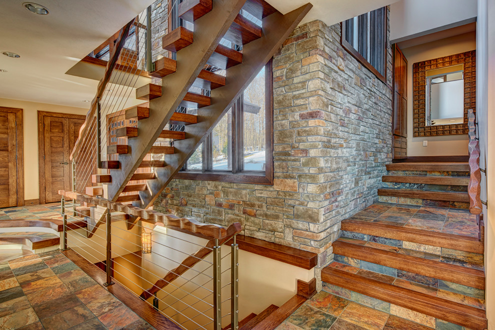 Example of a mid-sized mountain style staircase design in New York
