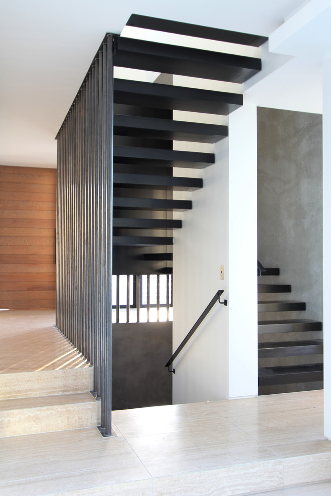 Inspiration for a contemporary staircase in Auckland with open risers.