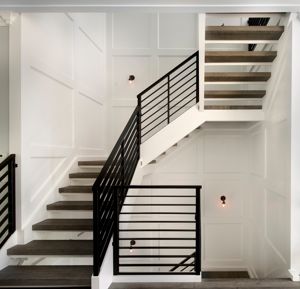 Diseño de escalera contemporánea sin contrahuella con escalones de madera
