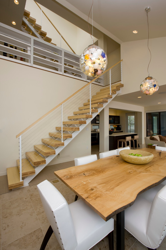 Contemporary wood straight staircase in Chicago with open risers.