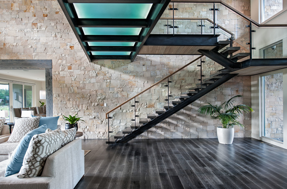 Expansive contemporary wood u-shaped staircase in Salt Lake City with open risers.
