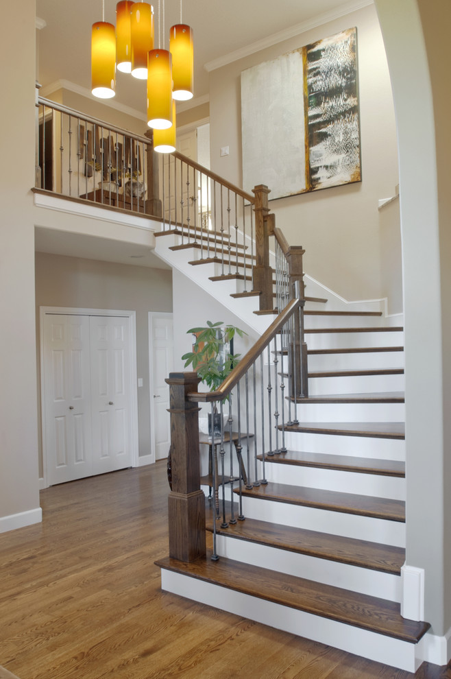 Example of a trendy wooden staircase design in Other