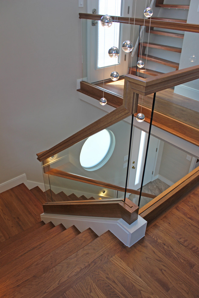Inspiration for a small contemporary wood l-shaped mixed railing staircase in Other with wood risers.