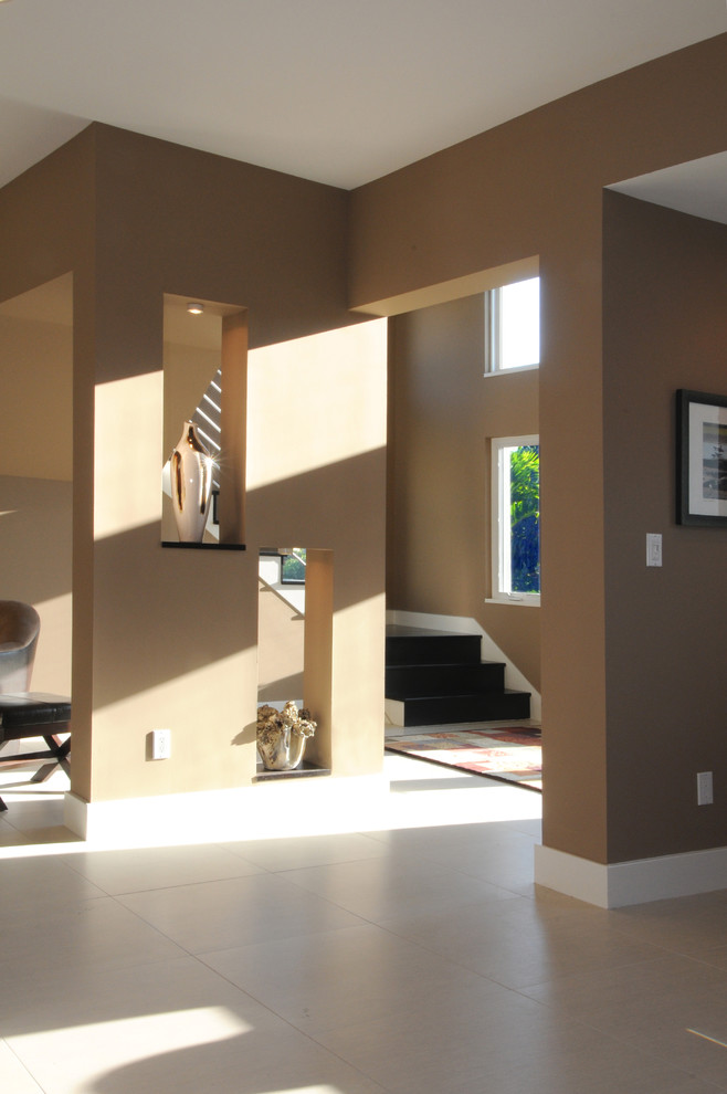 Example of a mid-sized trendy wooden l-shaped staircase design in Tampa with wooden risers