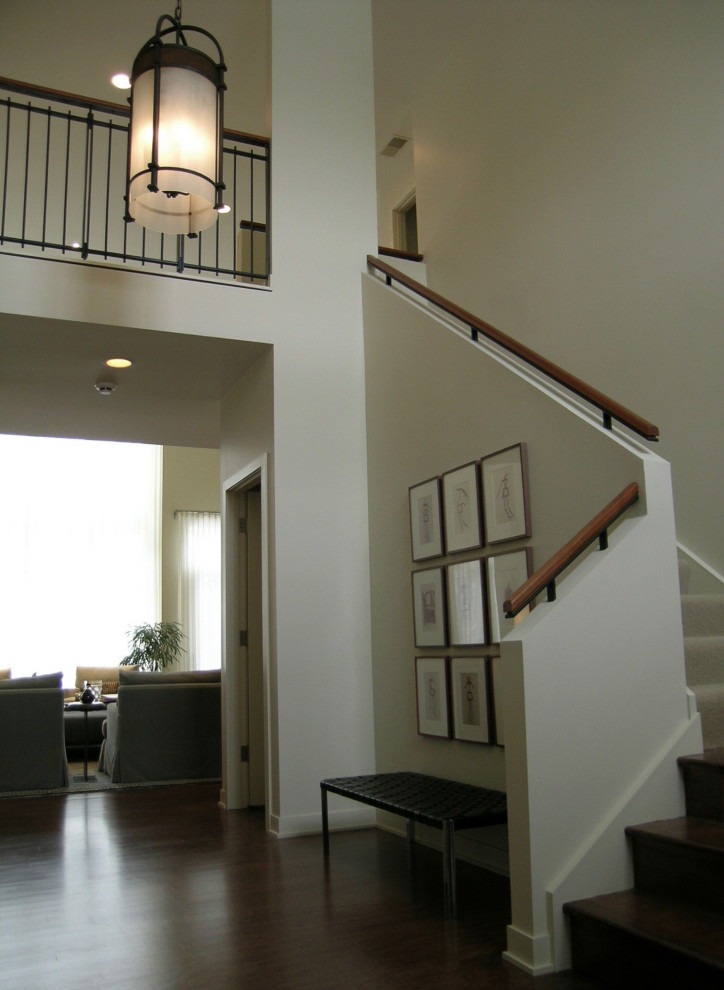 Photo of a large traditional l-shaped mixed railing staircase in Chicago.