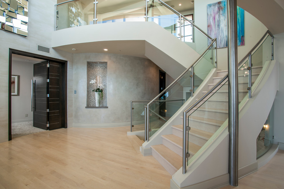 Design ideas for a medium sized contemporary wood staircase in Orange County with wood risers.