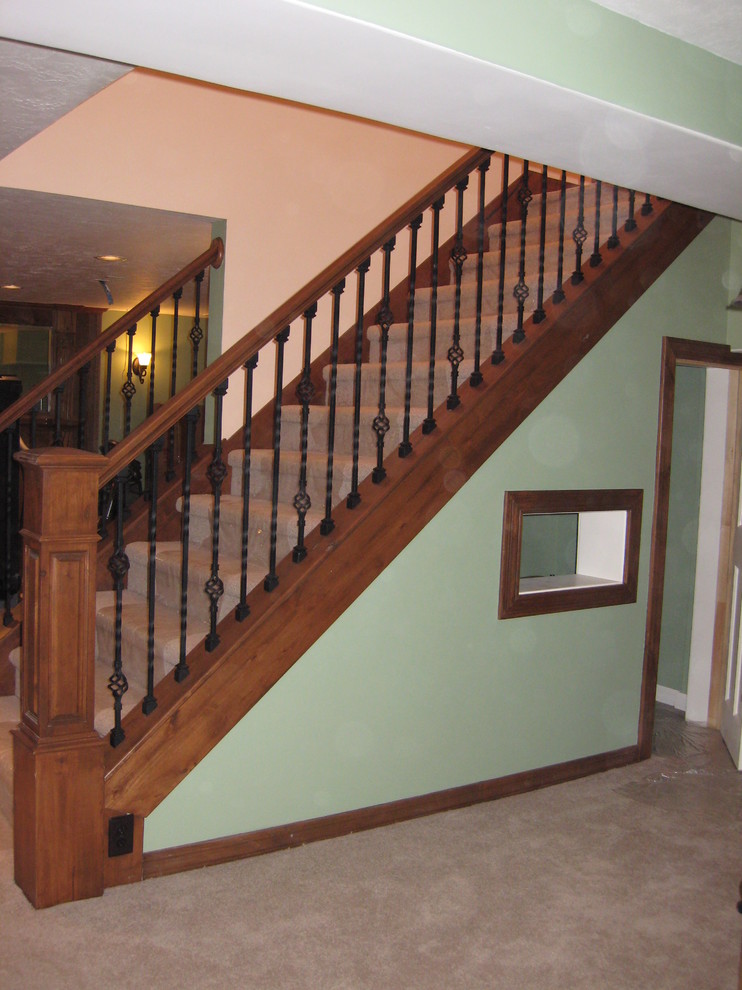 Mid-sized elegant carpeted straight staircase photo in Salt Lake City with carpeted risers