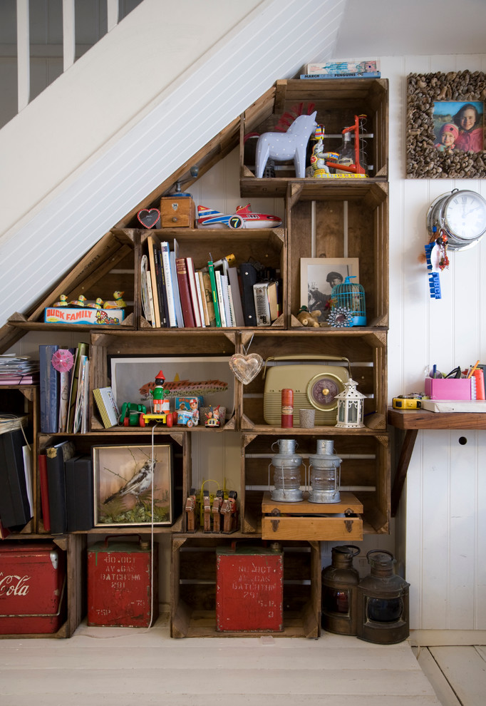 Example of a small cottage chic staircase design in London