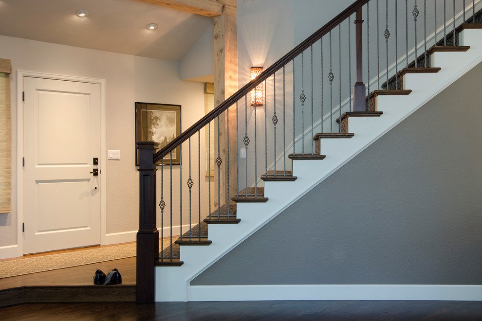 Mid-sized farmhouse carpeted straight mixed material railing staircase photo in Denver with carpeted risers