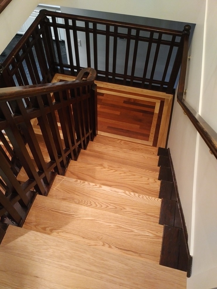 Staircase - mid-sized southwestern wooden u-shaped wood railing staircase idea in Vancouver with wooden risers