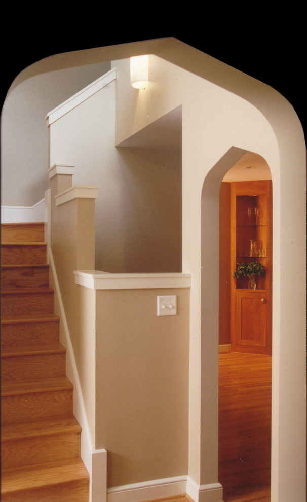 Inspiration for a medium sized contemporary wood l-shaped staircase in Kansas City with wood risers.