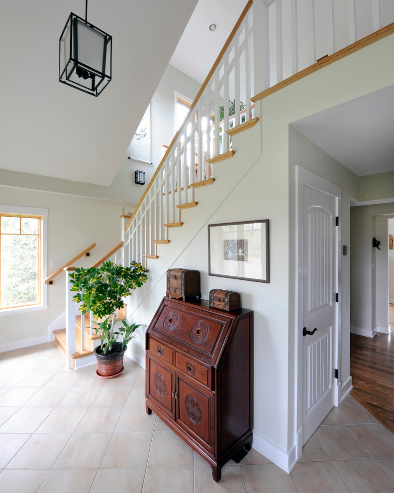 Staircase - mid-sized craftsman wooden l-shaped staircase idea in Ottawa with wooden risers