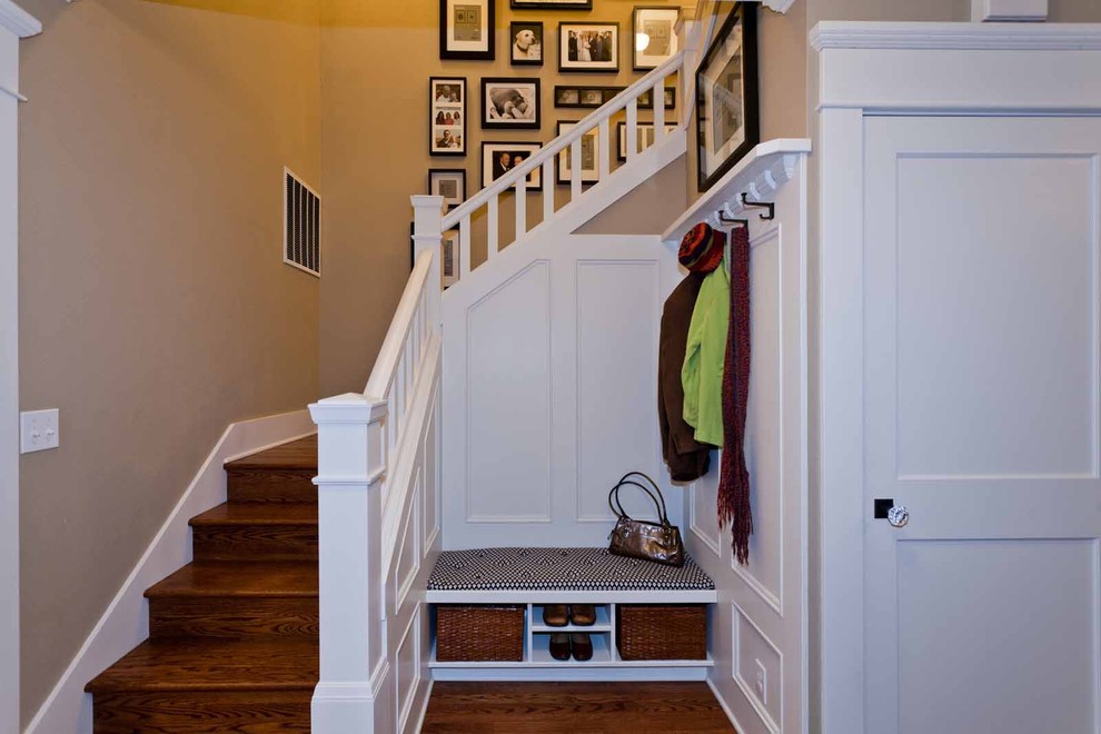 Mid-sized elegant wooden l-shaped staircase photo in Portland with wooden risers