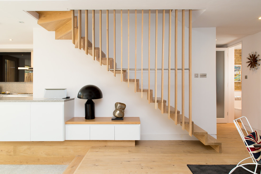 Scandi staircase in London with feature lighting.