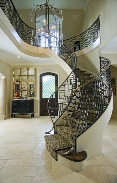 Curved Floating Staircase with Custom Iron and Bronze Railing ...