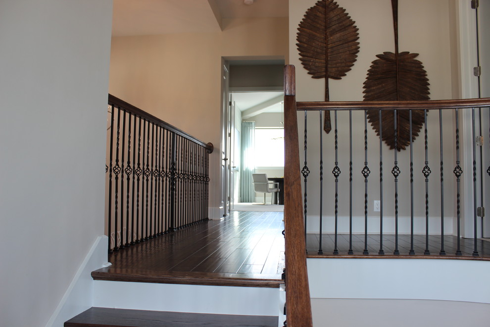 Curved Red Oak Stair with Single Basket & Twist Iron Balusters ...