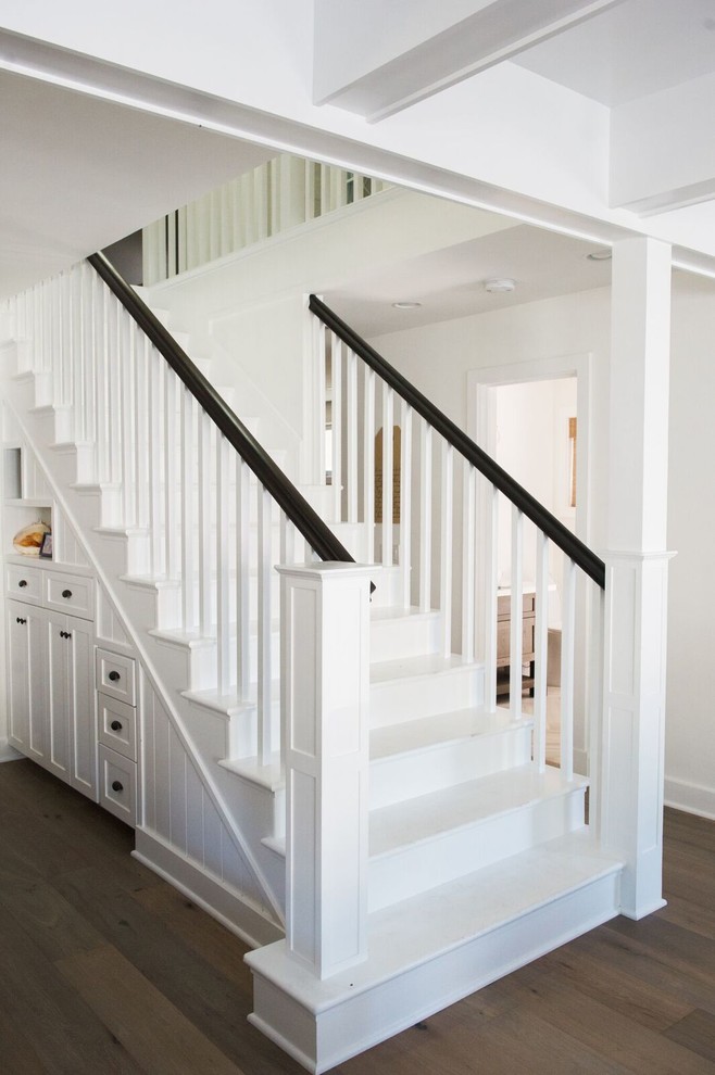Arts and crafts straight wood railing staircase photo in San Diego